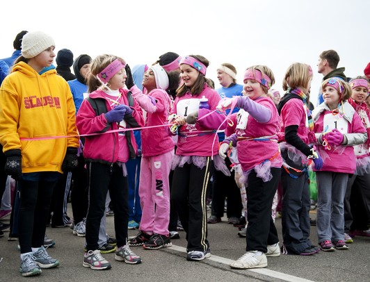 Young girls line up at the start of the Girls on the Run 5k in Ypsilanti on Sunday.